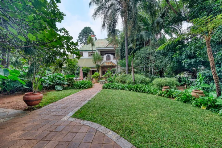 A garden path leading up to a family home
